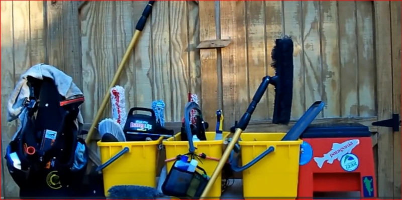 Professional window cleaning equipment: squeegees, strip washers, scrub brush, extension pole, buckets, and tool belt