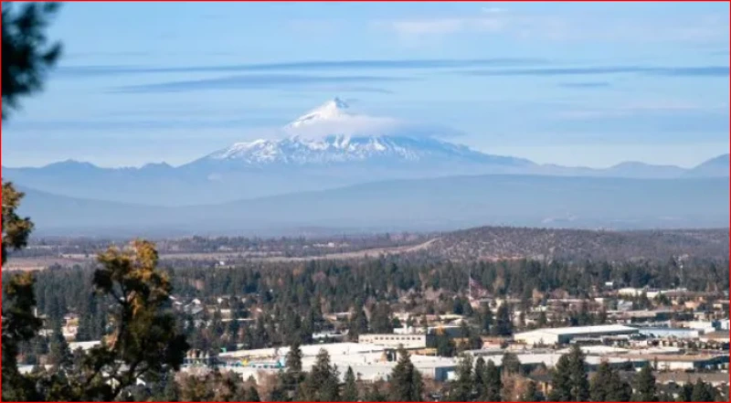 View over Bend, Oregon toward a snow-capped Cascade peak